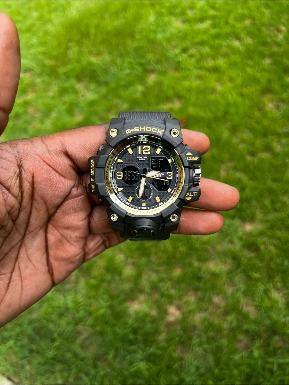 G-Shock Black and Gold Rugged Analog-Digital Watch